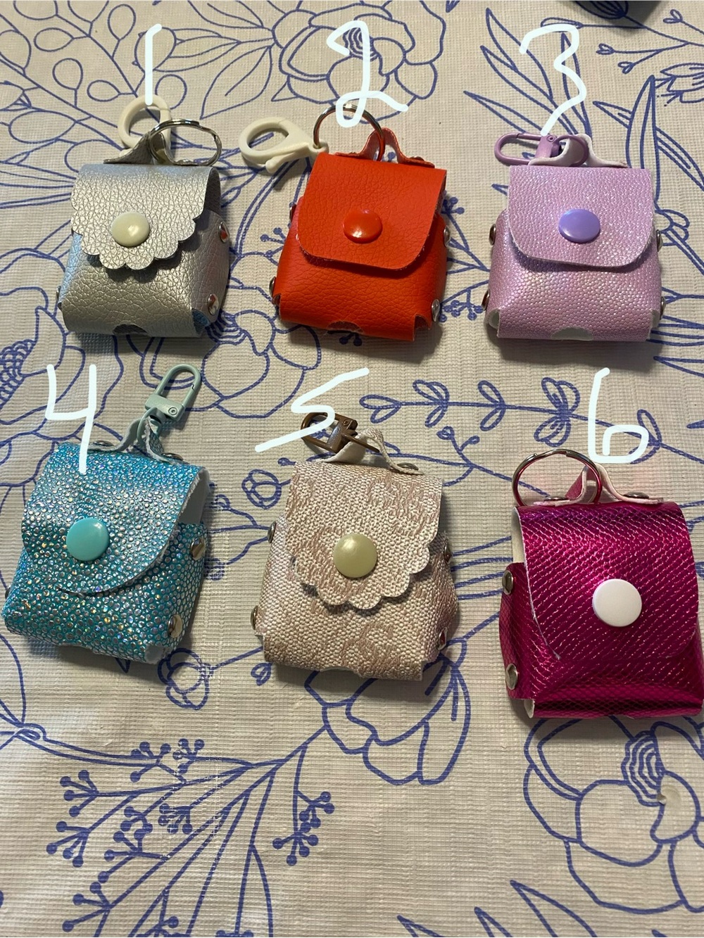 Pick two apple air pods holders
